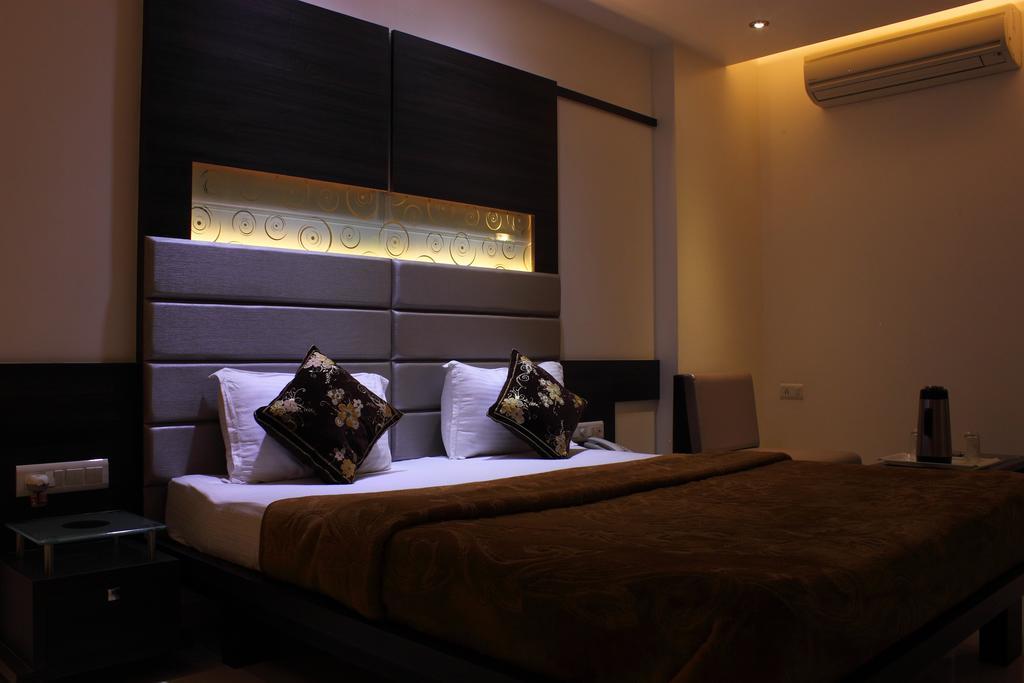 Hotel Apex Súrat Pokoj fotografie