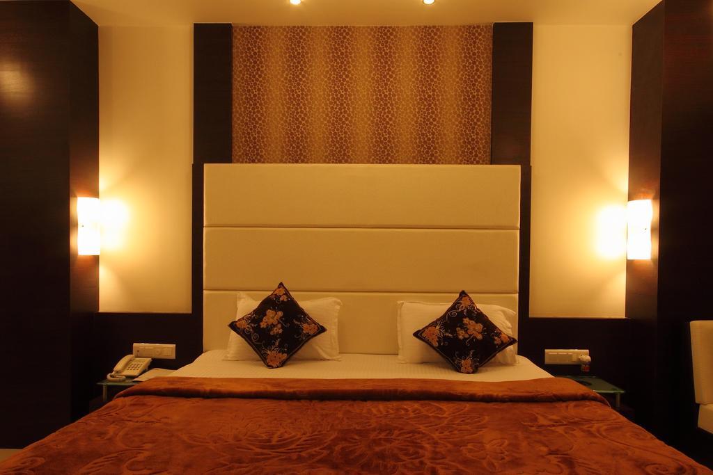 Hotel Apex Súrat Pokoj fotografie